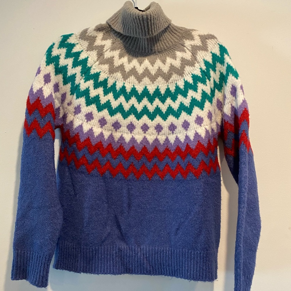 Urban Outfitters Argyle Ski Sweater
Size S- blue grey red and green multicolor